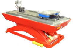 The 1"-10 acme lead screw and the 3 hp gear motor are shown assembled onto the slide with the scissors lift partially raised.