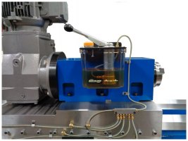 Close up view of the Bijur pump, reservoir, manifold, lubrication lines and meter units.