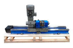 Side view showing MB65 block spindle with 7.5 hp Nord gearmotor mounted on HHW15 hardened way slide with 86” long base, 29” long saddle, servo motor mount, one shot lubricator and two limit switches.