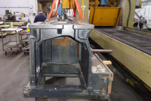 We surface ground the (3) “V” ways, (1) flat way and (2) strap surfaces of this Mazak Powermaster Lathe Bed to ± .0002” over 172.5” on our Favretto TU600 surface grinder at right.