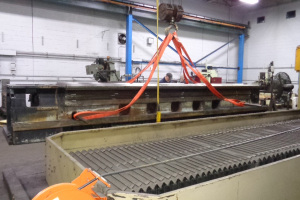 We surface ground the ways of this Mazak Powermaster Lathe Bed to ± .0002” over 172.5” on our Favretto TU600 surface grinder in the foreground.