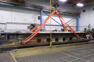 We surface ground the ways of this 29” high x 32” wide x 201” long Mazak Powermaster Lathe Bed to ± .0002” over 172.5” on our Favretto TU600 surface grinder in the background.