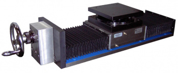 LHW9: 9” wide low profile hardened way slide with acme lead screw, hand wheel, offset drive, accordion way covers and SW8 swivel. Used for grinding.