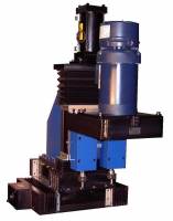 MB275/MB275/LBW10/ LBW10/LBW12: two spindles mounted to a three axis slide assembly with ball screws, motor mounts, accordion way covers and air cylinder. Used for cutting paper rolls.