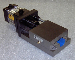 CB4: dovetail slide with air cylinder and stop rod. Used for tooling.