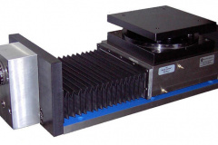 LHW9: 9” wide low profile hardened way slide with acme lead screw, hand wheel, offset drive, accordion way covers and SW8 swivel. Used for grinding.