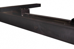 LBW6/LBW10: 6" wide low profile ball way slide mounted on a 10" wide ball way slide with a 132" long x 12" square tube as a base. Used to cut carbon fiber.