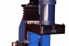 MB275/MB275/LBW10/ LBW10/LBW12: two spindles mounted to a three axis slide assembly with ball screws, motor mounts, accordion way covers and air cylinder. Used for cutting paper rolls.