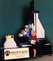 Flexmatic 4-axis Machining Cell 6-Head Turret/Rotary Table/Special Base with Chip Flume. Custom Enclosure
