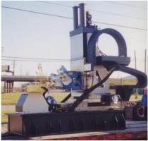 Flexmatic Machine Fitted with Cable Carriers. Featuring Rotating Vertical Ballscrew Nut