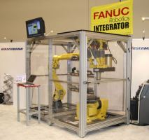 GE Fanuc F-200iB hung vertically with MC40 spindle, 5Hp,3600 RPM, 2-Axis Rotary Table, M20iA part transfer Robot. Custom Enclosure for IMTS Show only.
