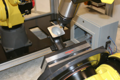 2-Axis Postioner rotated along with F-200iB with spindle normal to work-piece face to show flexibility.
