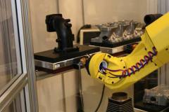 M20iA Robot with ATI end-effector for clamping and unclamping Hirschmann pallet.